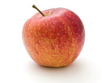 Close-up of a vibrant red apple with a stem, isolated on a white background.